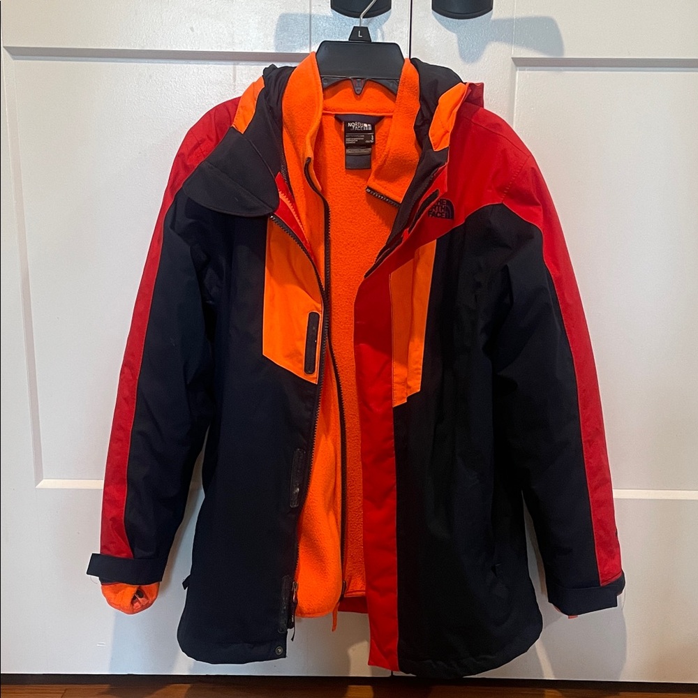 The North Face Kids' Navy Red, and Orange Puffer Jacket